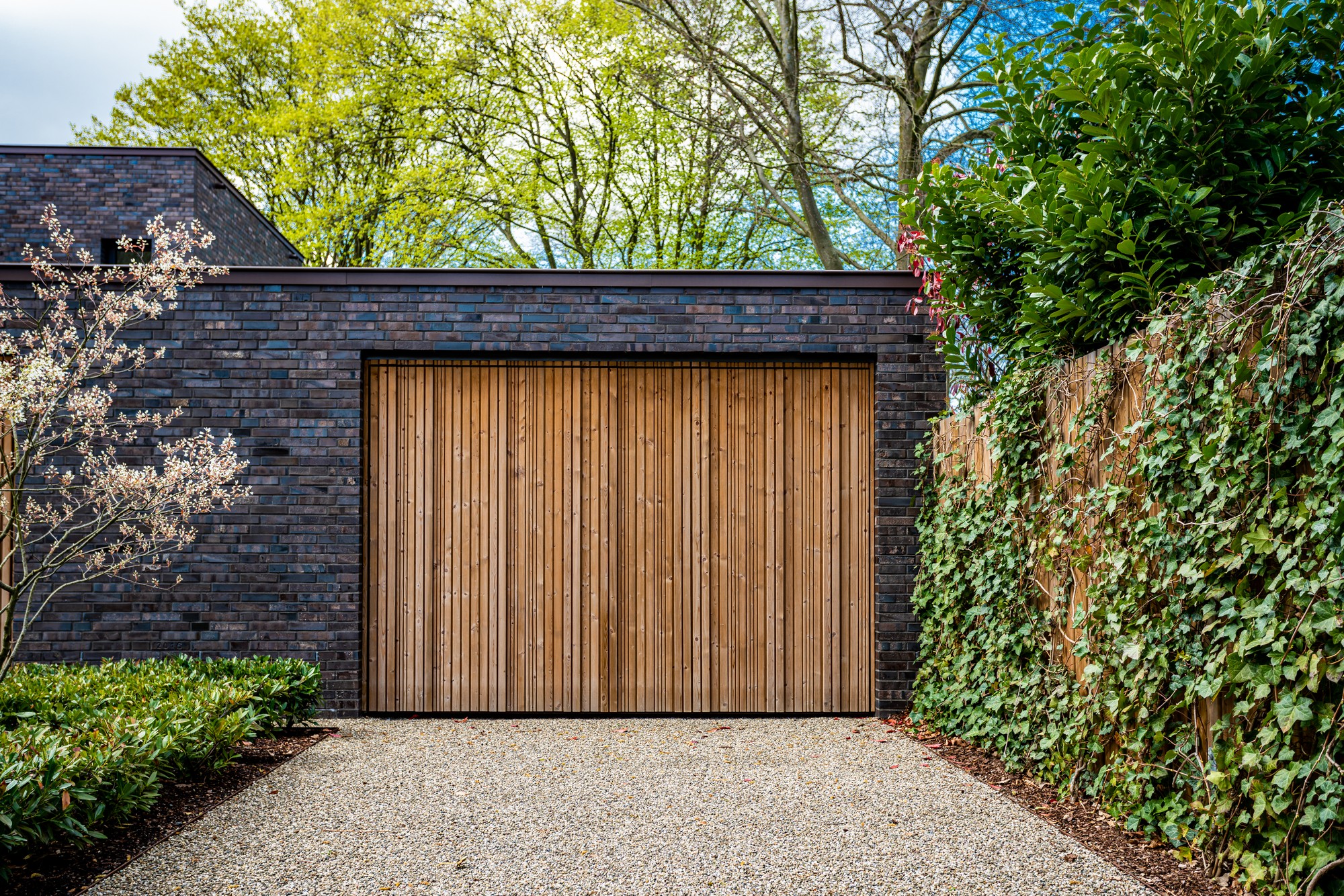 Wide Garage Door And Concrete Driveway In Front 2021 09 02 07 52 58 Utc